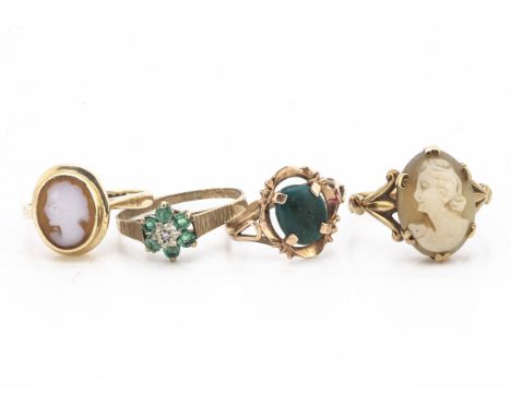 Two 9ct gold cameo rings, an emerald and diamond cluster ring, yellow metal dress ring with stone af, 7g (4)