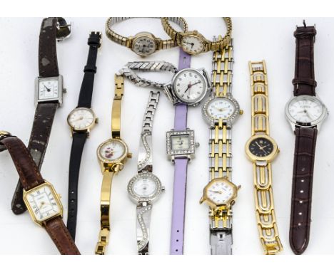 A small collection of ladies wristwatches, including a 9ct gold cased Garrard example, a Timex and others