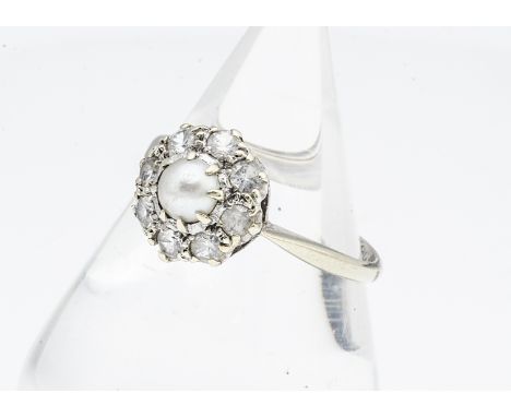 A 9ct gold pearl and white sapphire cluster ring, ring size R, 3.1g