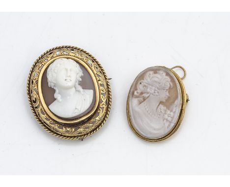 A French gold mounted shell cameo, centred with portrait of a classical woman facing, in an open scrollwork and rope twist mo