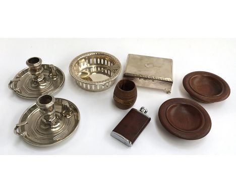 A pair of metal candlesticks with snuffers, an EPNS coaster with gadrooned edge, an EPNS cigarette box, two turned wood pin d