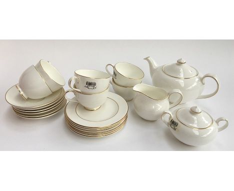 A Royal Doulton Langdale Gold tea service in mint condition