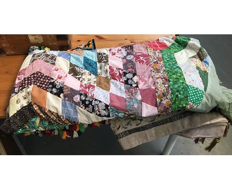 A wall hanging, four saddle bags with camel motif, a vintage patchwork double bedspread, together with a crochet blanket