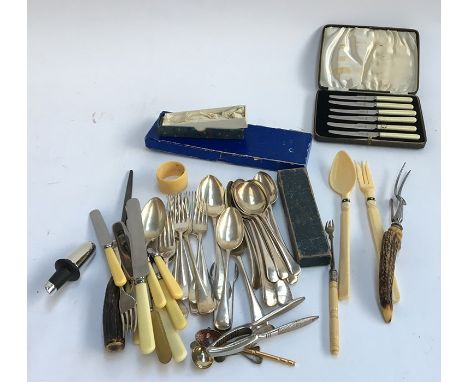 A mixed quantity of vintage flatware, some boxed