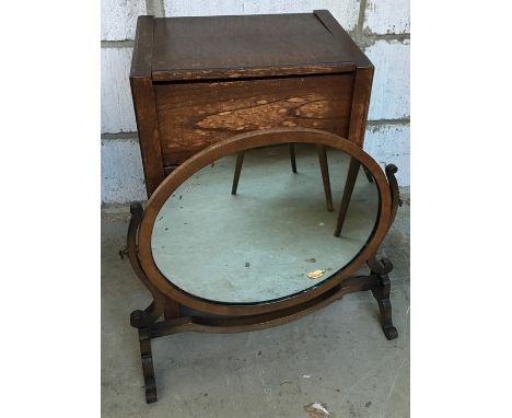 A mid-century sewing box with hinged lid and single drawer and contents, and an adjustable oval mirror