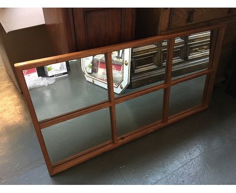 A white and gold wall mirror with chamfered edges and bevelled glass, 90cmH, and one other in the form of a window pane
