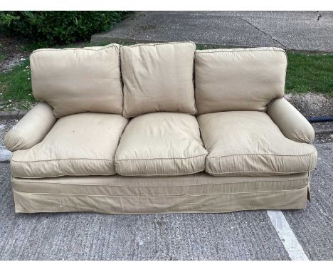 Large three seater modern sofa, with feather stuffed upholstery,  raised on castors, approximately 195cm wide