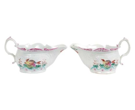 A pair of Philip Christian Liverpool moulded sauceboats, circa 1770, with scrollwork rims and handles, polychrome decorated w