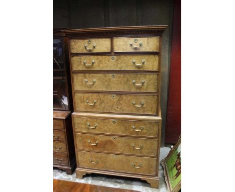 Fine George III burr walnut chest on chest, with Greek key moulded cornice and two short over seven long drawers on bracket f