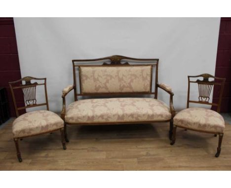 Edwardian walnut and inlaid salon suite, comprising twin seater sofa and two upholstered chairs, each with foliate inlaid cre