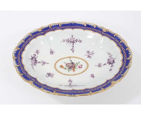 18th century Worcester footed dish, of oval form with wavy rim, the centre with polychrome floral spray, with further sprays 