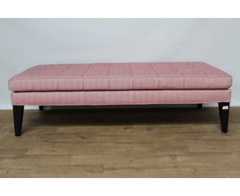 Modern button upholstered long stool, raised on square tapered ebonised supports, 152cm long