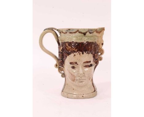 Prattware loving cup, circa 1790, modelled to two sides with masks of the Royal couple George III and Queen Charlotte, impres