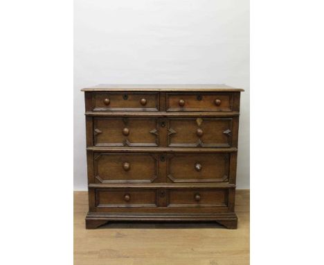 Late 17th century oak geometric moulded chest of drawers, having two short over three long graduated drawers on later bracket