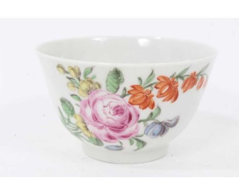 A Worcester tea bowl, circa 1758, polychrome painted with flowers in the Rogers style, 7cm diameterGood condition. Some minor