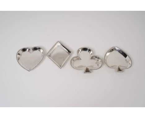 Set of four Edwardian silver ashtrays in the form of the four playing card suites, Hearts, Clubs, Spades and Diamonds (Sheffi