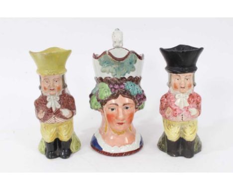 Staffordshire Pearlware character jug, early 19th century, in the form of a woman with grapevines around her head, the scroll