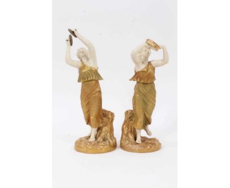 Pair of Royal Worcester blush ivory figures of musicians, model numbers 1441 and 2016, 25.5cm and 28cm highCondition report: 