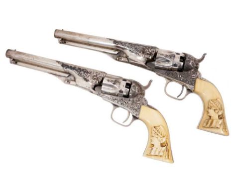 A very fine cased pair of silver plated Gustave Young deluxe engraved .36 Cal. Colt Model 1862 Police revolvers, 61/2 inch si