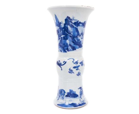 Chinese blue and white beaker vase, Kangxi period (1662-1722), the upper section decorated with figures in a mountainous land