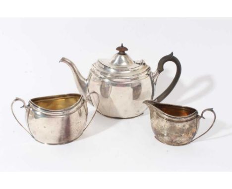 Silver teapot with matching silver sugar basin and silver cream jug of oval navette form (London 1927) 28ozs in total