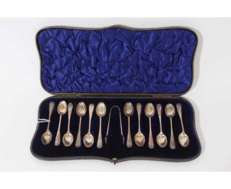 Cased set of twelve silver Hanoverian Rattail pattern coffee spoons, with matching sugar tongs (London 1906) William Hutton &
