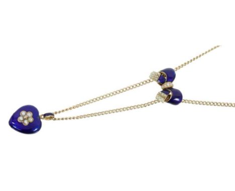 Antique blue enamel and seed pearl heart shaped pendant locket with a diamond and seed pearl flower and glazed compartment to