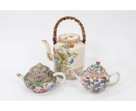 An 18th century Chinese blue and white teapot with clobbered enamel decoration, together with a 19th century Canton teapot, a