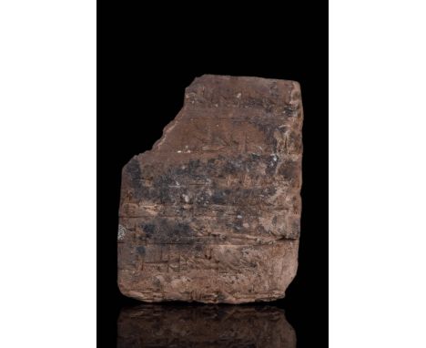 Circa 1900 BC A large rectangular Babylonian clay cuneiform tablet inscribed with fourteen names. Possibly the record of name