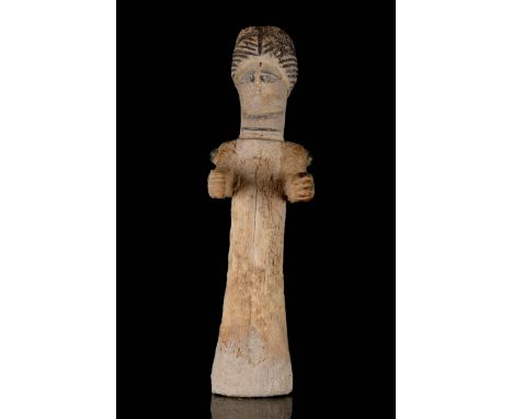 Circa 200 AD A carved human female bone idol figure or doll modelled in the half-round, arms held at right-angles to the body