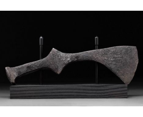 Circa 900-1000 AD An iron bearded axe head with a, heavy blade, a lentoid shoulder and a round socket. The bearded axe, was c