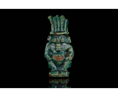 Late Period, Circa 664 - 332 BC. A finel glazed ancient Egyptian glazed composition amulet of the dwarf god Bes in deep green