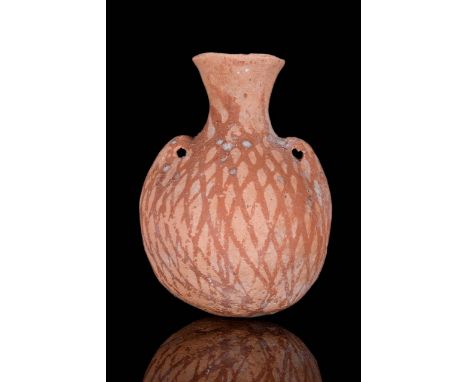 Circa 3100 – 2900 BC. Round terracotta amphoriskos with fluted spout and two small twin ‘ear’ lug handles on either side for 