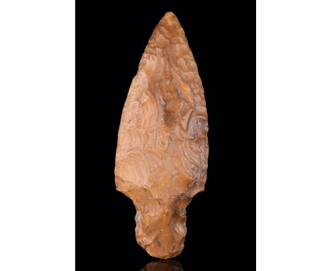 Circa 8000-6000 BC. Flat spearhead of brownish flint. With a clearly indented base. Formed by an early modern man (Homo sapie