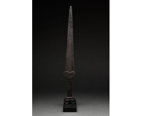 Circa 600-400 BC. A finely decorated Iron Acinaces-type sword with pointed, elongated triangular blade, B-shaped guard, recta