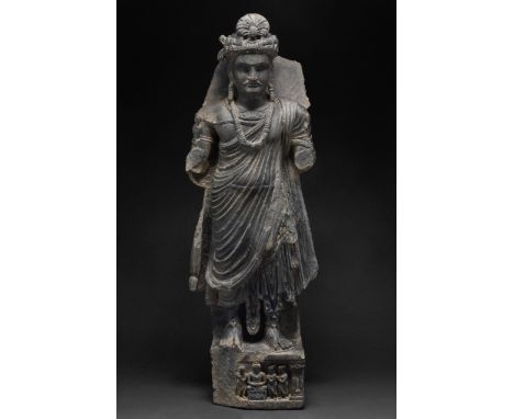 Circa 200-300 AD A remarkable example of Kushan artistry, richly carved in grey schist, combining naturalism of the classical