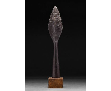 Circa 900-1000 AD. A Viking socketed leaf-shaped iron spearhead; raised central ridge and integral hollow handle. Lateral hol
