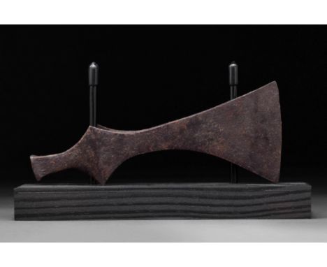 Circa 900-1000 AD An iron bearded axe head with a, heavy blade, a lentoid shoulder and a round socket. The bearded axe, was c