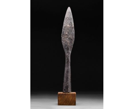 Circa 100-300 AD. A Roman socketed leaf-shaped iron spearhead; raised central ridge and integral hollow handle. Lateral holes