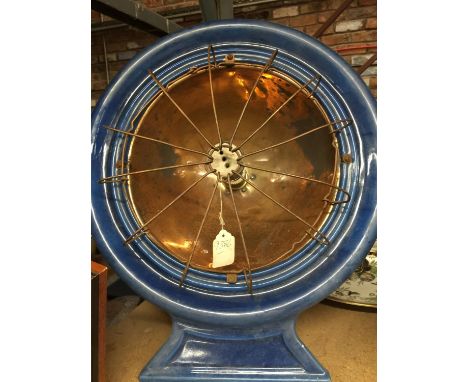 A VINTAGE COPPER AND ENAMEL HEATER 