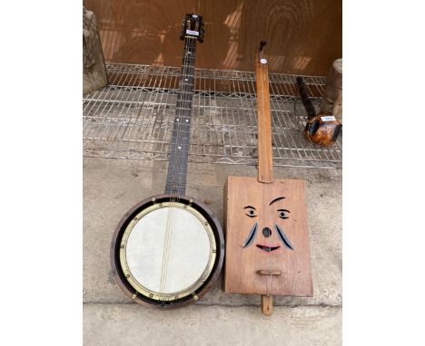 A VINTAGE BANJO AND A POLISH FOLK MUSIC INSTRUMENT 