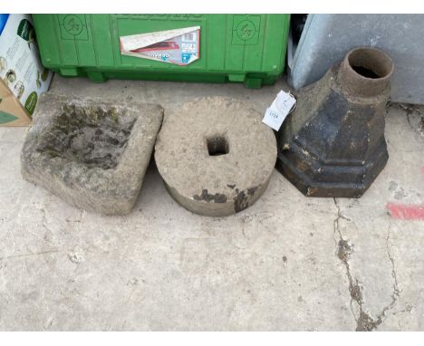 A SMALL STONE TROUGH, A GRIND STONE AND A CAST IRON GUTTER HOPPER 
