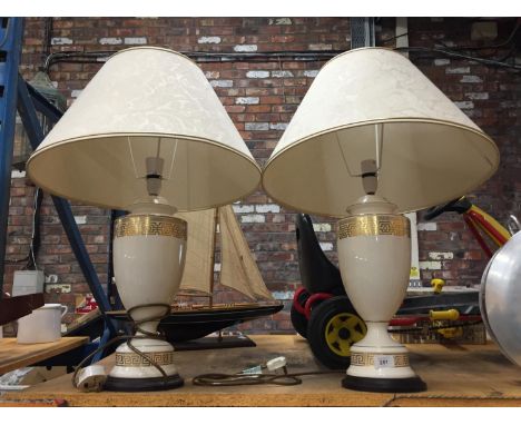 A PAIR OF CREAM CERAMIC TABLE LAMPS WITH GILT GREEK KEY DESIGN HEIGHT APPROX 39CM TO TOP OF LAMP BASE 
