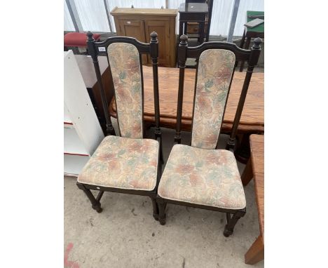 A PAIR OF ERCOL DINING CHAIRS ON TURNED LEGS AND UPRIGHTS 