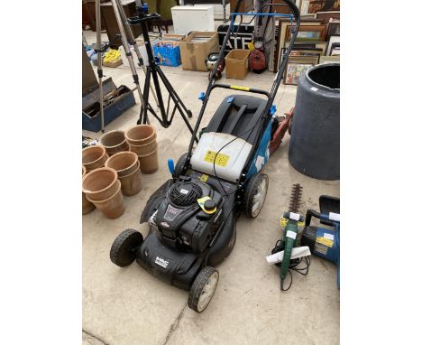 A MACCALLISTER PETROL ENGINE LAWN MOWER WITH GRASS BOX 