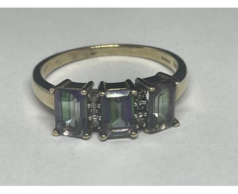 A 9 CARAT GOLD RING WITH THREE MYSTIC TOPAZ AND DIAMONDS SIZE Q/R 