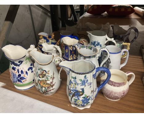 A LARGE QUANTITY OF CERAMIC JUGS TO WOODSWARE, WEDGWOOD, ROYAL WINTON, BURLEIGH WARE ETC., 