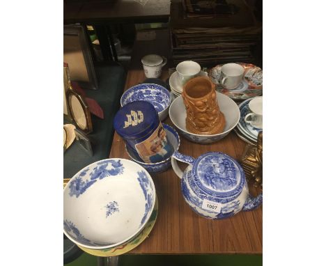 A QAUNTITY OF CERAMIC ITEMS TO INCLUDE A TERRACOTTA BRUSH POT DECORATED WITH CHERUBS, BLUE AND WHITE POTTERY BOWLS, TEAPOT, E