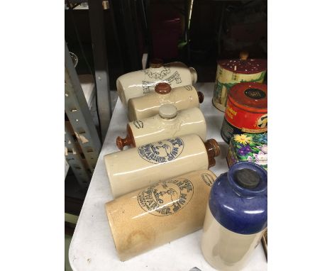 SIX VINTAGE STONEWARE HOT WATER BOTTLES TO INCLUDE DOULTON'S IMPROVED FOOT WARMER, THE BONNE NUIT FOOTWARMER, ETC 