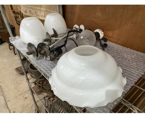 AN ASSORTMENT OF VINTAGE AND RETRO LIGHT FITTINGS AND GLASS SHADES 